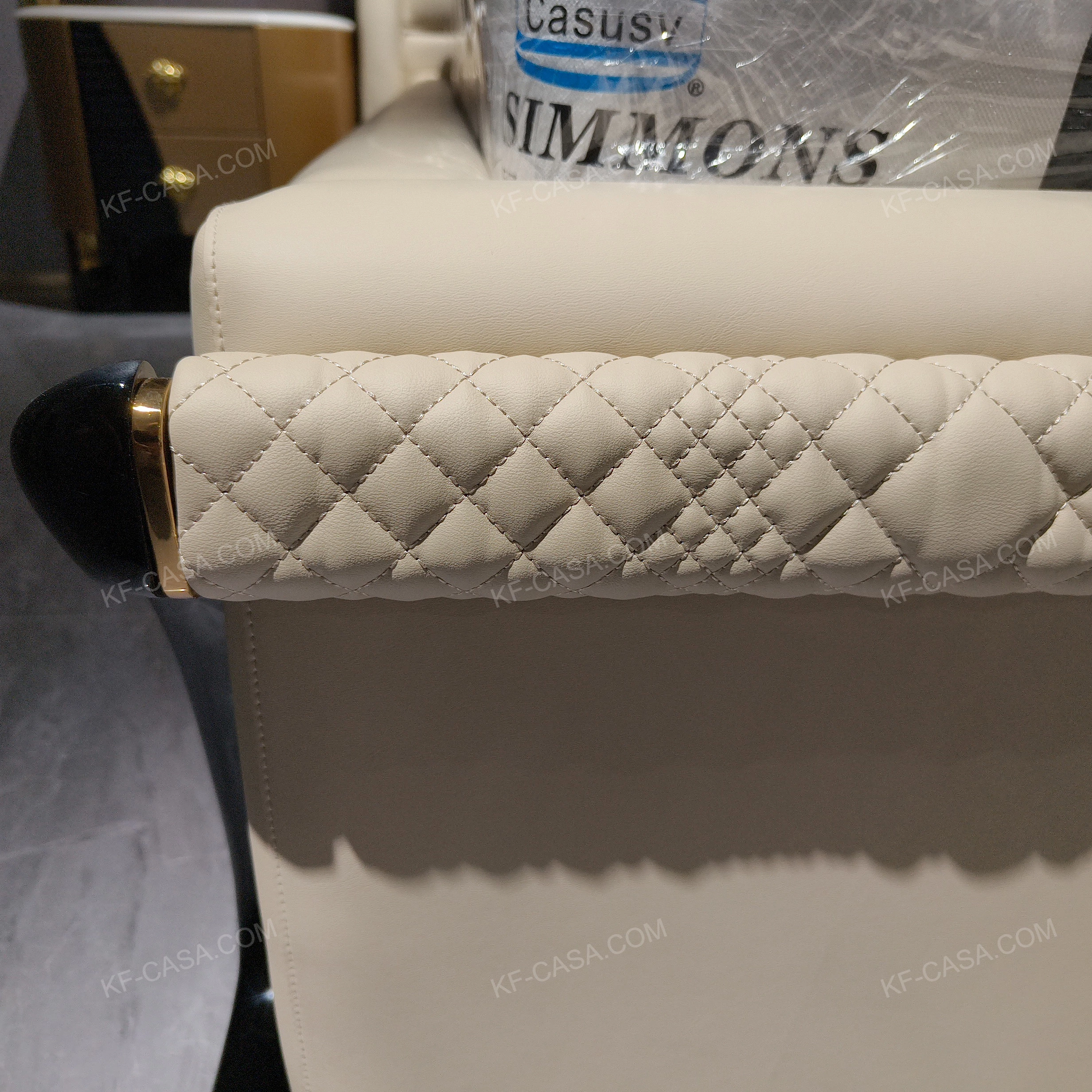 Creamy Ivory Upholstered Bed with Diamond-Quilted Detailing, Gilded Emblem & High-Gloss Natural Wood Veneer Trim